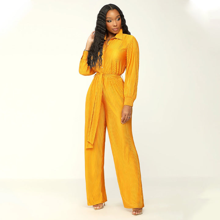 Damernas eleganta långärmad jumpsuit med figursydd midjedetalj Mirla-Eva Jonsson