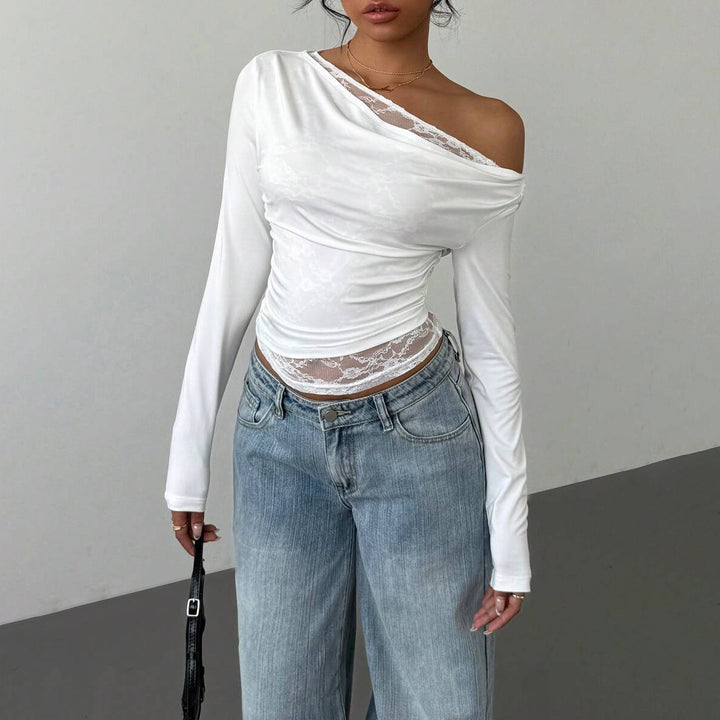 Damernas eleganta långärmade t-shirt med asymmetrisk halsringning och spetsdetalj Mirla-Eva Jonsson