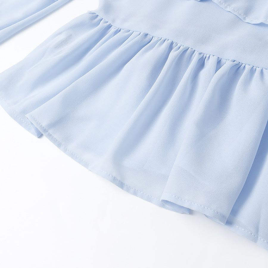 Damernas eleganta lätta blus med volangdetaljer Mirla-Eva Jonsson