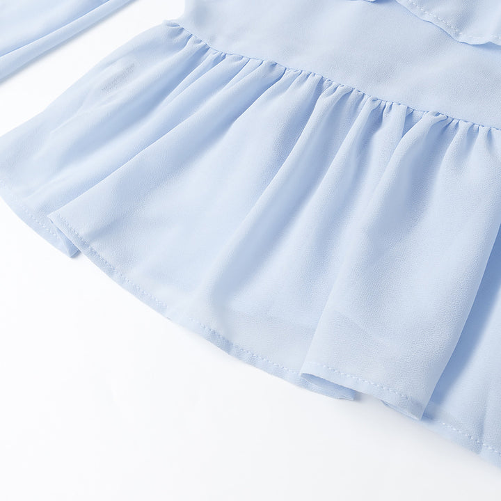 Damernas eleganta lätta blus med volangdetaljer Mirla-Eva Jonsson