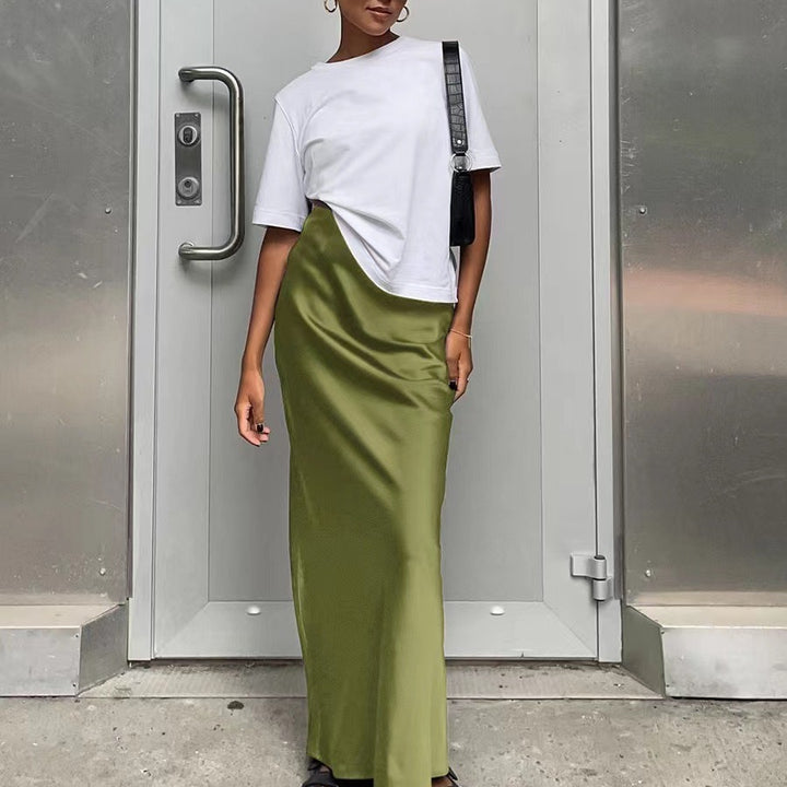 Damernas eleganta maxiklänning med asymmetrisk skärning och dekorativt överkast Eva Jonsson-Eva Jonsson