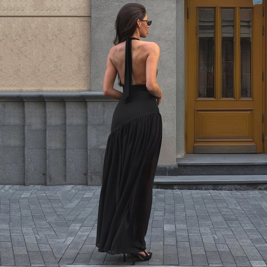 Damernas eleganta maxiklänning med raffinert halterdesign och genomskinlig kjol Mirla-Eva Jonsson