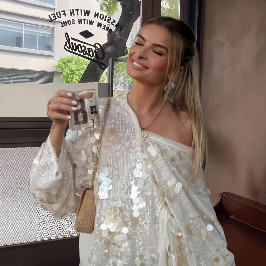 Damernas eleganta och glittrande sidenblus Mirla-Eva Jonsson