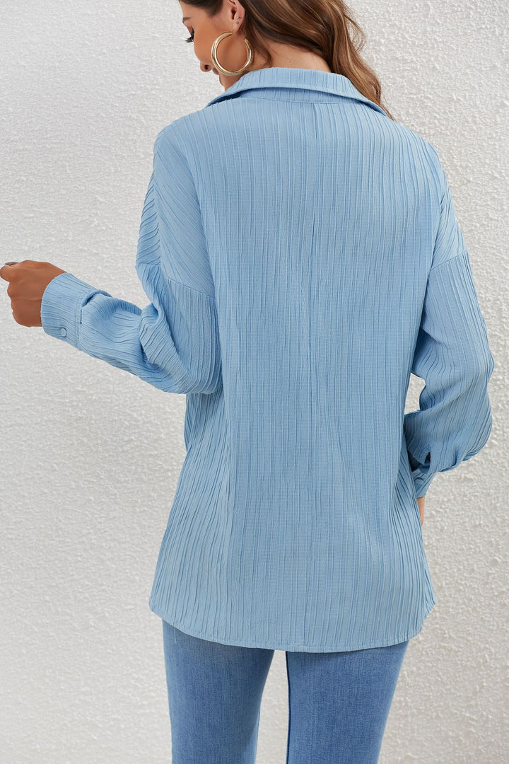 Damernas eleganta och lösa långärmad blus i randigt mönster Mirla-Eva Jonsson