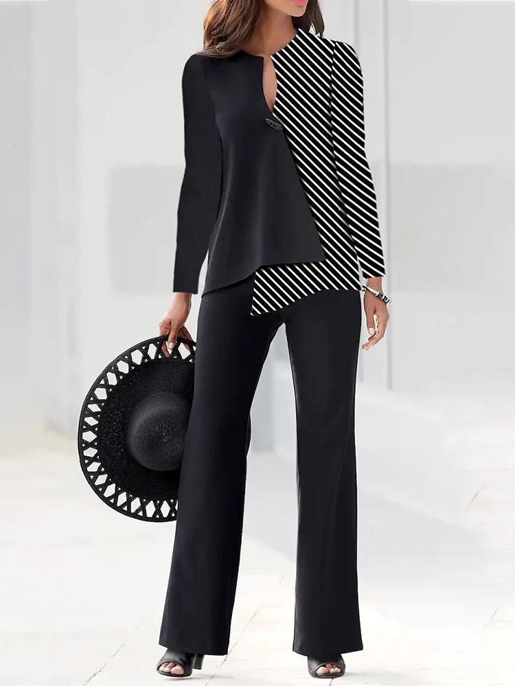 Damernas eleganta och moderna kostymset med asymmetrisk design Mirla-Eva Jonsson