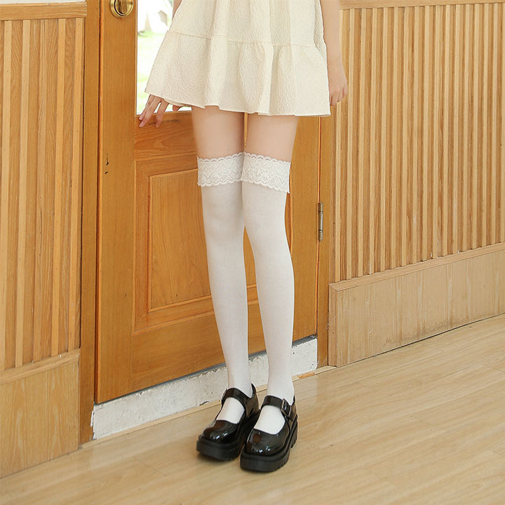 Damernas eleganta overknee-strumpor med romantiskt spetskant Eva Jonsson-Eva Jonsson