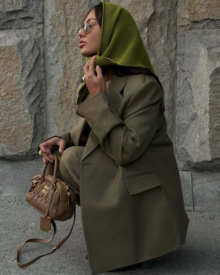 Damernas eleganta oversized kavaj med fickor och vid skärning Mirla-Eva Jonsson
