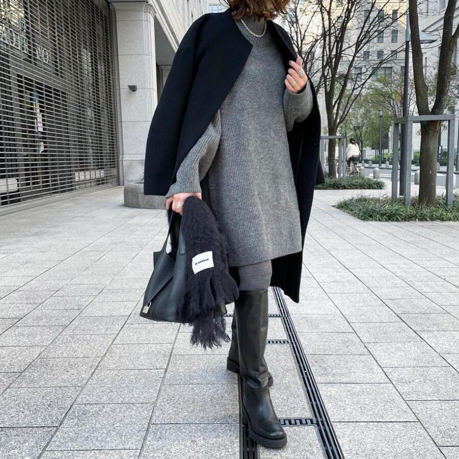 Damernas eleganta oversized vinterkappa med knapppdetaljer Mirla-Eva Jonsson