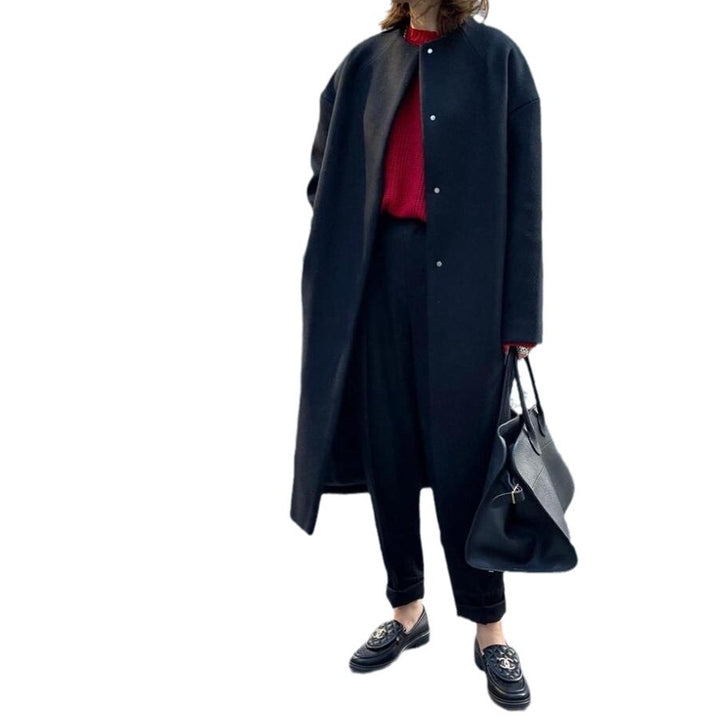 Damernas eleganta oversized vinterkappa med knapppdetaljer Mirla-Eva Jonsson