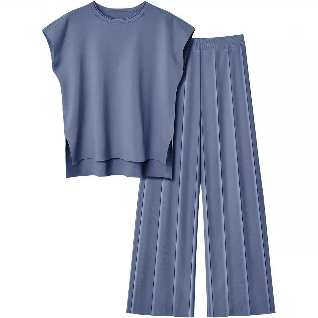 Damernas eleganta set med kortärmad topp och plisserad byxa Mirla-Eva Jonsson