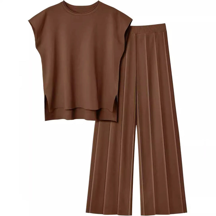 Damernas eleganta set med kortärmad topp och plisserad byxa Mirla-Eva Jonsson