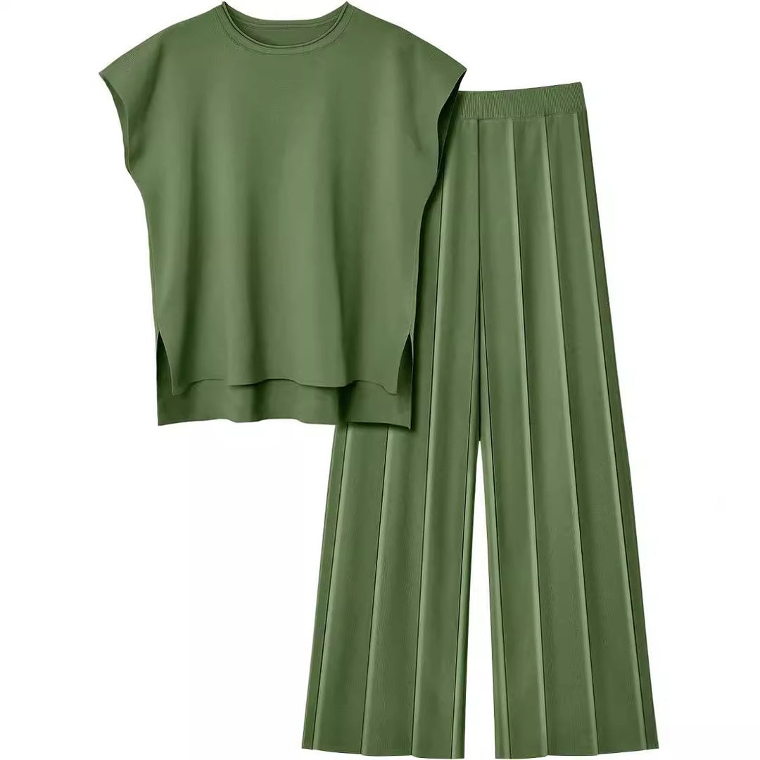 Damernas eleganta set med kortärmad topp och plisserad byxa Mirla-Eva Jonsson