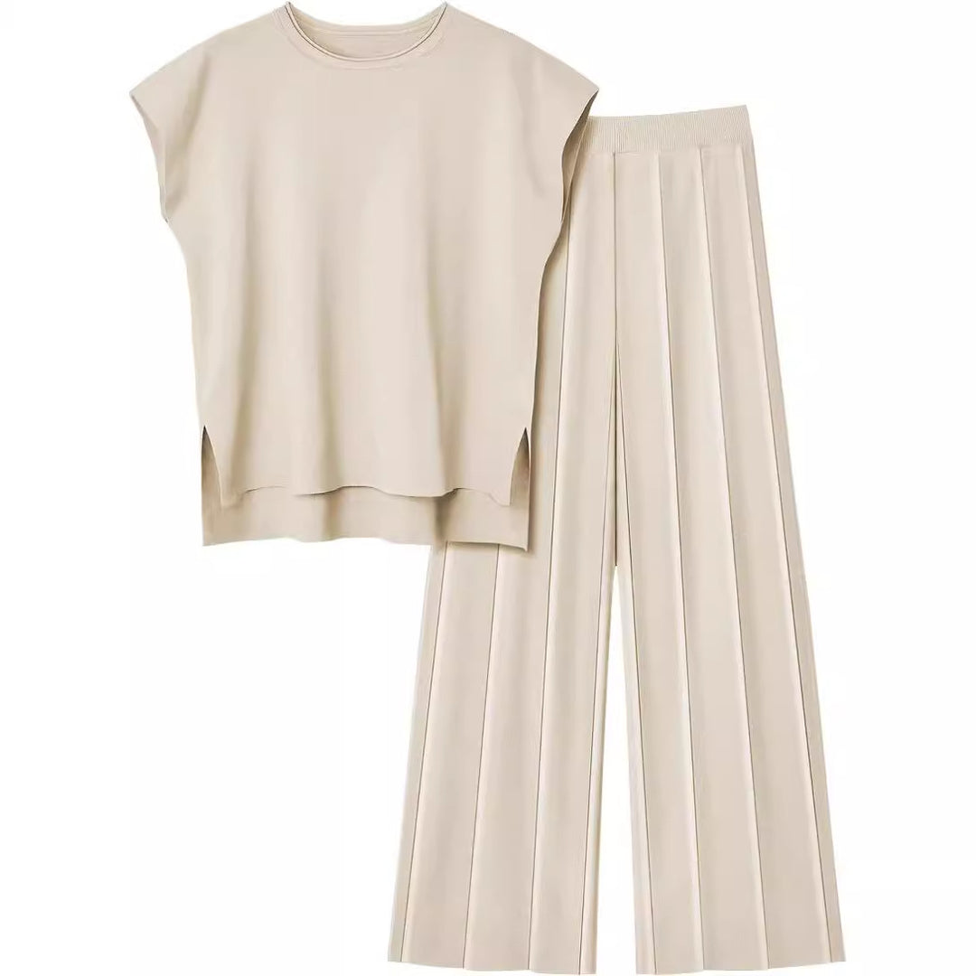 Damernas eleganta set med kortärmad topp och plisserad byxa Mirla-Eva Jonsson