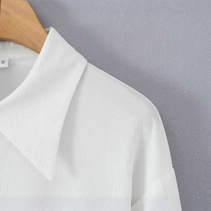 Damernas eleganta skjortklänning med volangdetaljer Mirla-Eva Jonsson