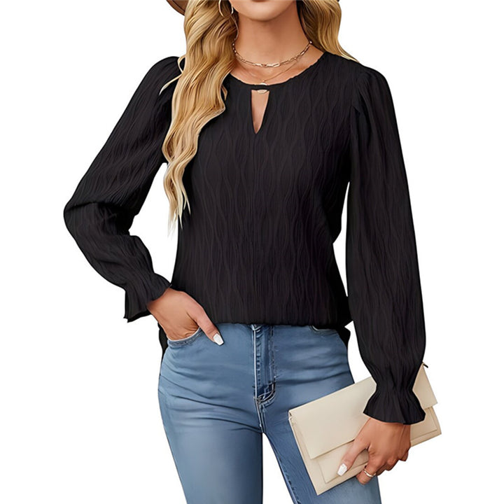 Damernas eleganta stickad blus med volangdetaljer Mirla-Eva Jonsson
