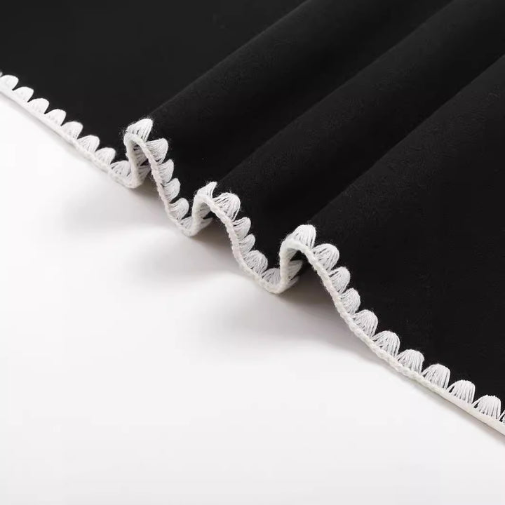 Damernas eleganta stickad kavaj-set med kontrasterande detaljer Mirla-Eva Jonsson