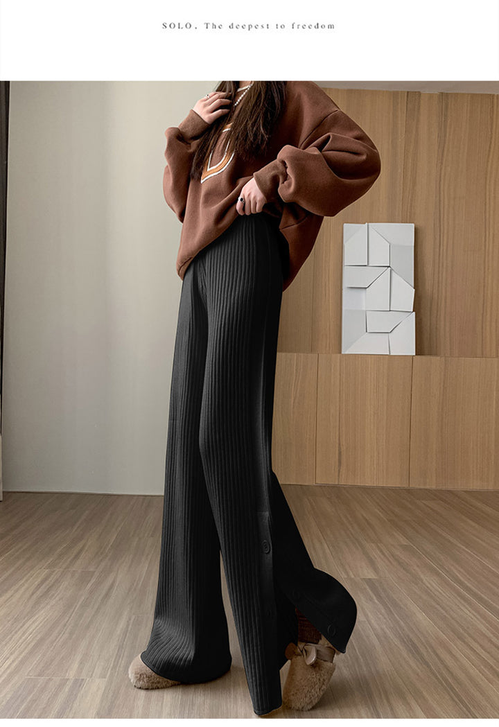 Damernas eleganta stickade byxor med dekorativa knapppdetaljer Eva Jonsson-Eva Jonsson