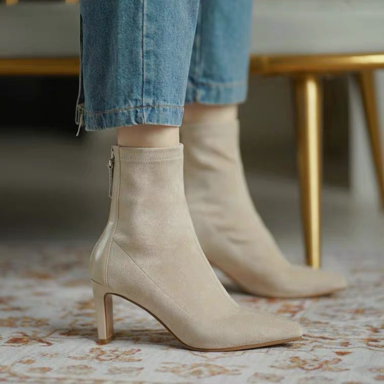 Damernas eleganta stövletter med spetsig tå och sidodragkedja Mirla-Eva Jonsson