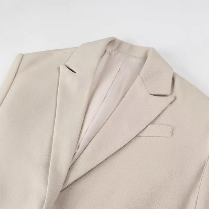 Damernas eleganta trenchcoat med svängande fransar Mirla-Eva Jonsson