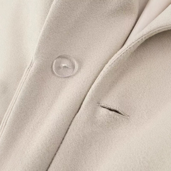 Damernas eleganta trenchcoat med svängande fransar Mirla-Eva Jonsson