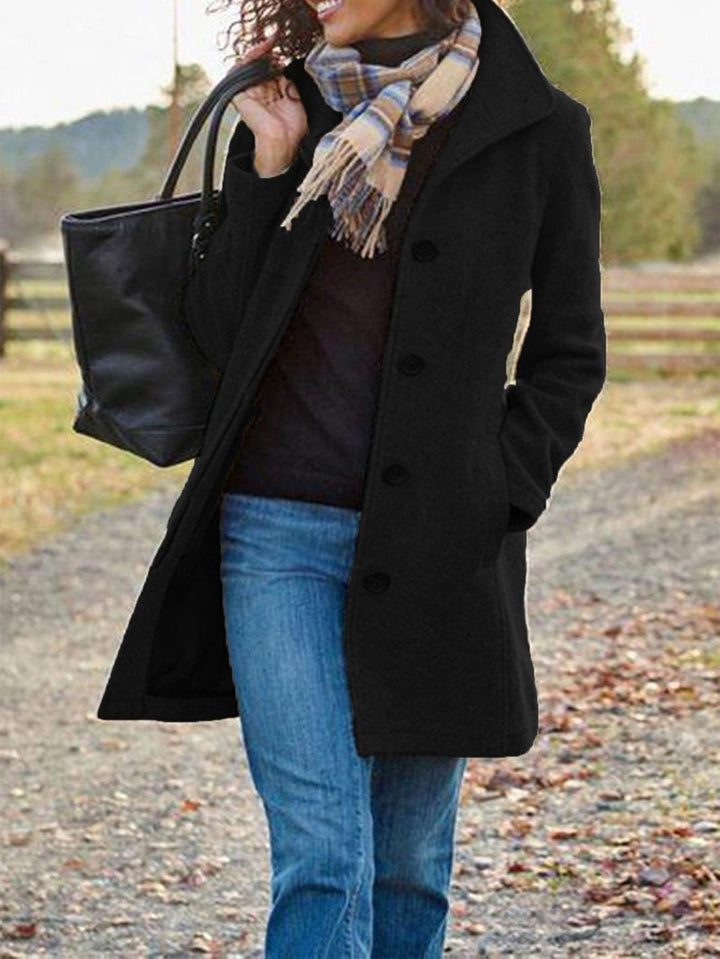 Damernas eleganta ullkappa Mirla-Eva Jonsson