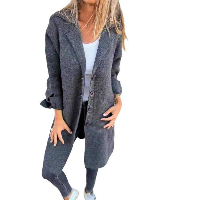Damernas eleganta ullkappa med praktiska fickor Mirla-Eva Jonsson