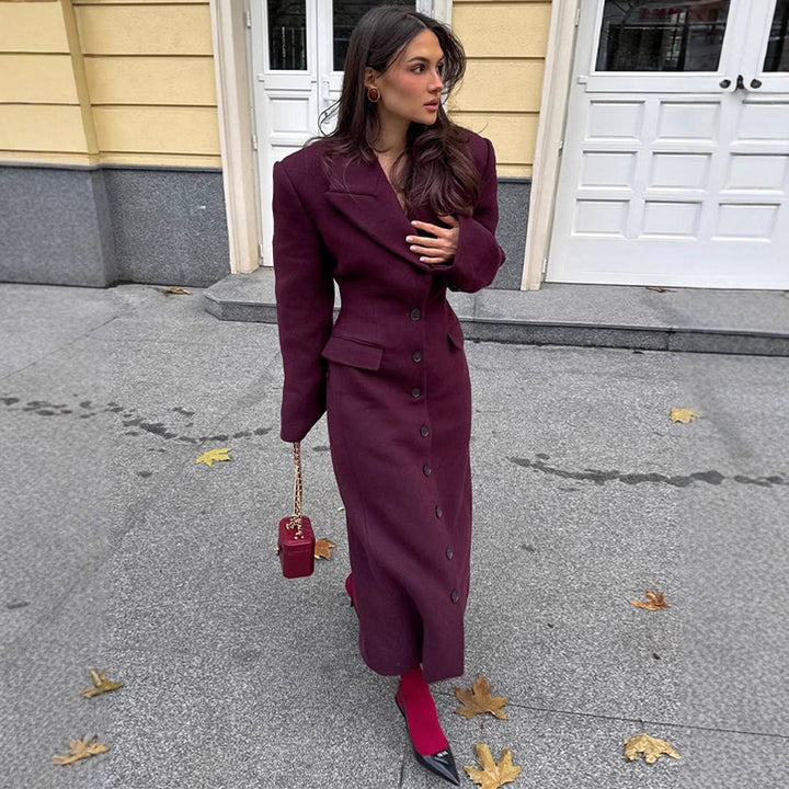 Damernas eleganta ullkappa med strukturerad design och praktiska fickor Eva Jonsson-Eva Jonsson