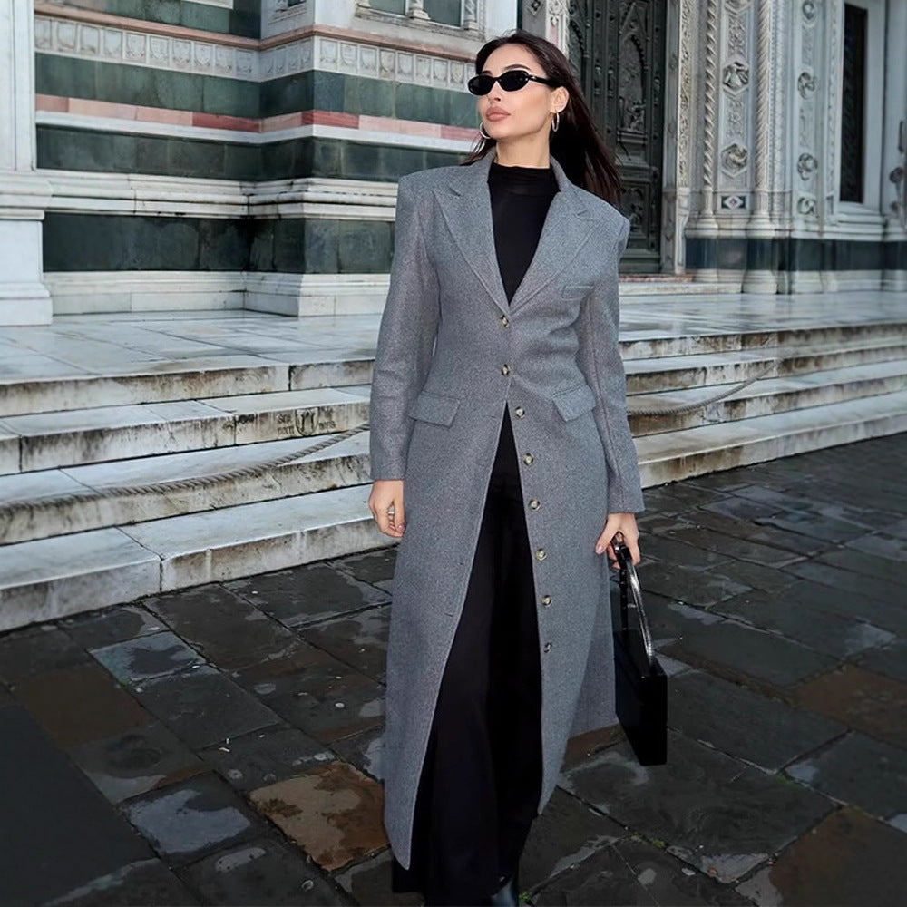 Damernas eleganta ullkappa med strukturerad design och praktiska fickor Eva Jonsson-Eva Jonsson