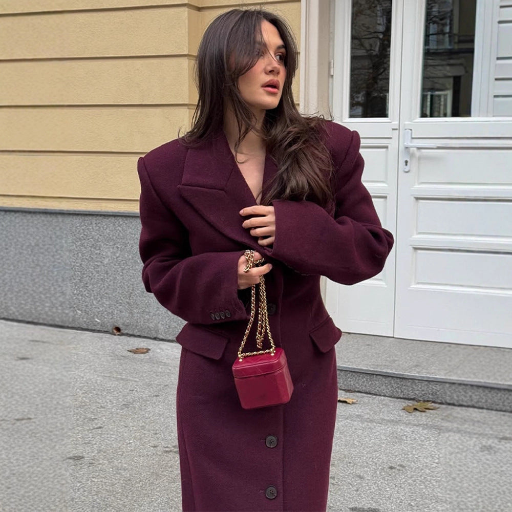Damernas eleganta ullkappa med strukturerad design och praktiska fickor Eva Jonsson-Eva Jonsson
