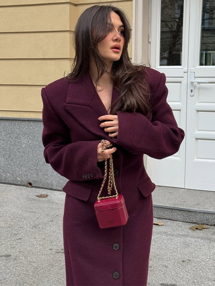 Damernas eleganta ullkappa med strukturerad design och praktiska fickor Eva Jonsson-Eva Jonsson