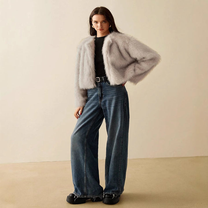 Damernas extravaganta kortärmad pälsjacka med voluminösa ärmar Mirla-Eva Jonsson