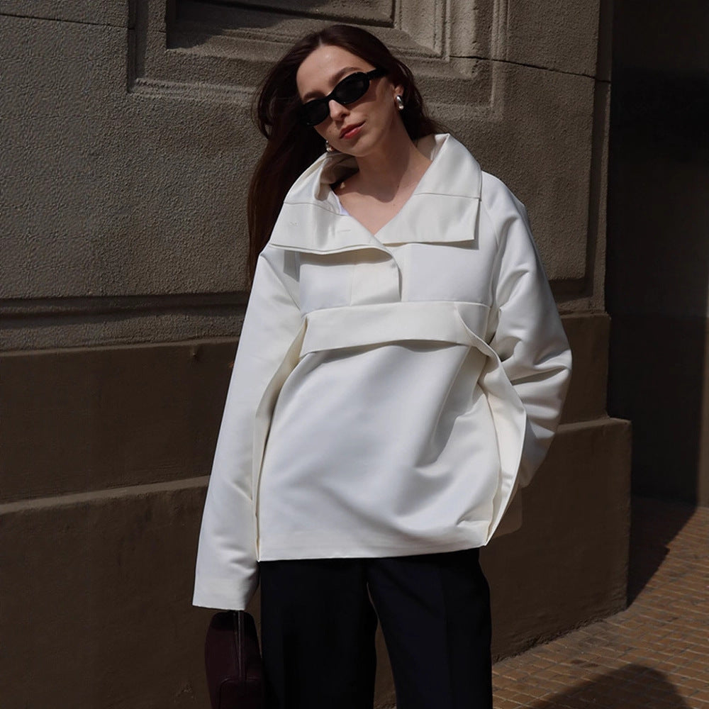 Damernas fashionabla blusjacka med chic midjebälte och voluminösa ärmar Mirla-Eva Jonsson