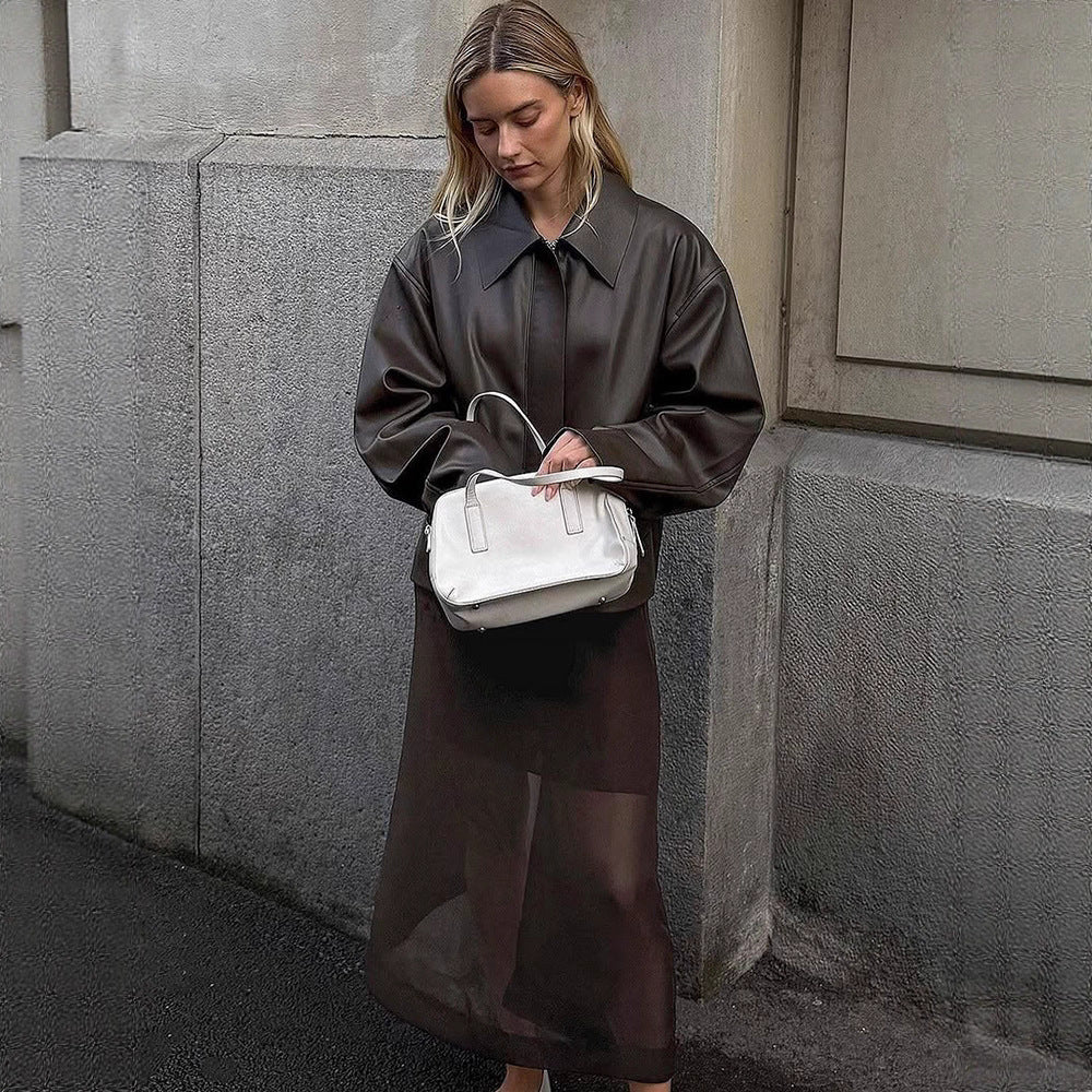 Damernas fashionabla konstläderjacka med oversized design Mirla-Eva Jonsson