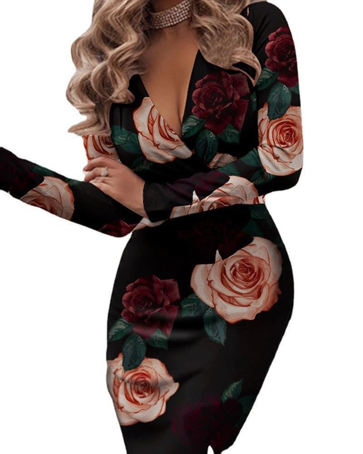 Damernas figurnära omslagsklänning med blommönster Eva Jonsson-Eva Jonsson