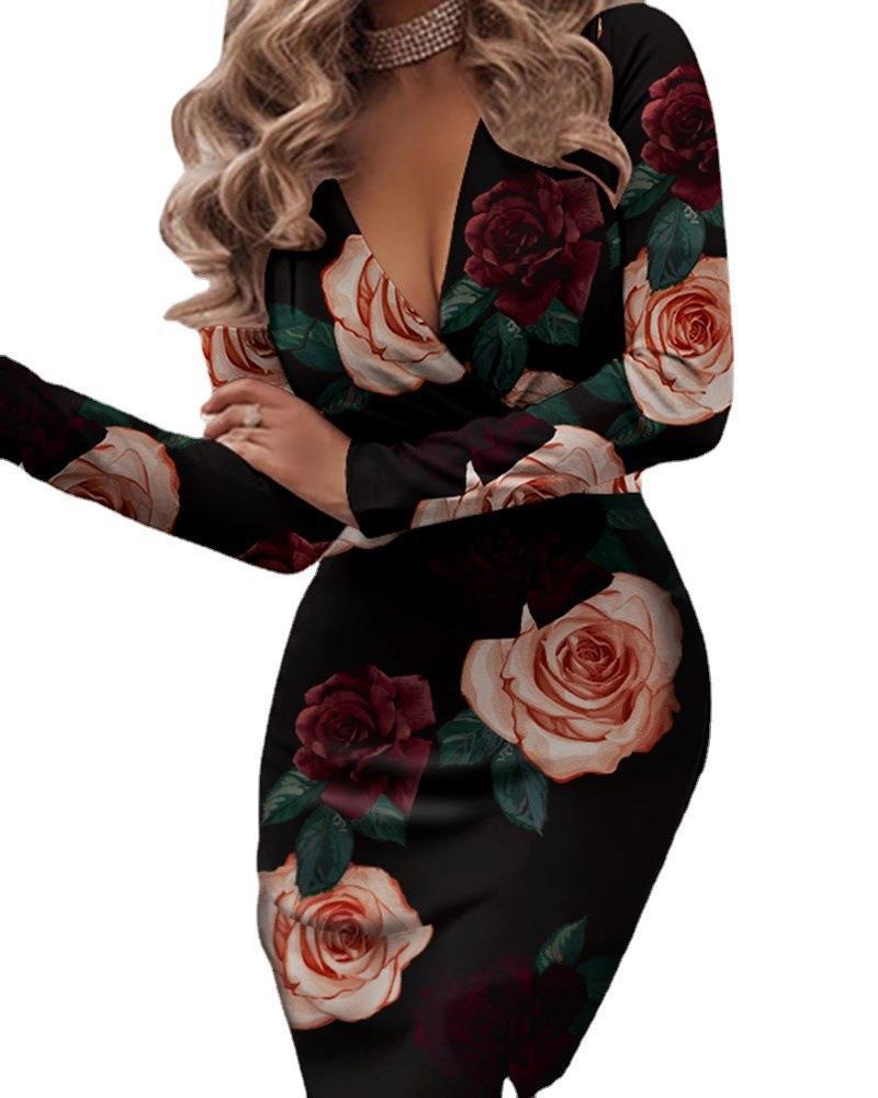 Damernas figurnära omslagsklänning med blommönster Eva Jonsson-Eva Jonsson