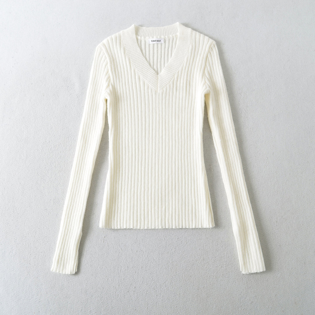 Damernas figurnära ribbad topp med V-hals Mirla-Eva Jonsson