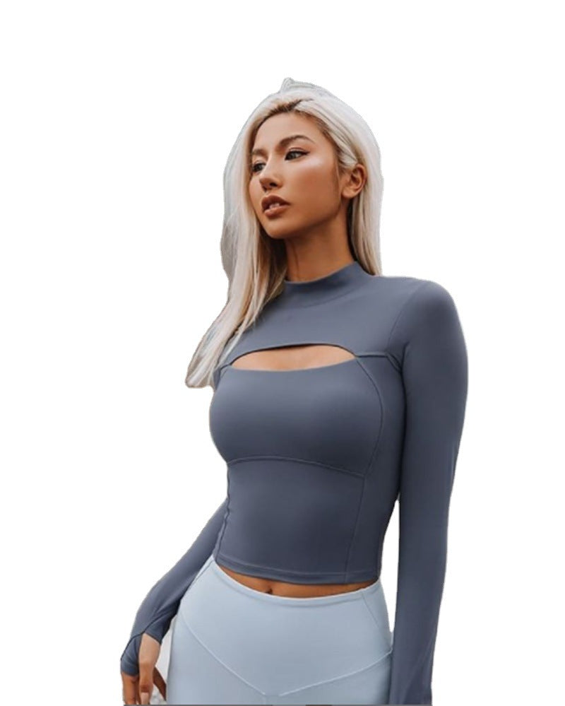 Damernas figurnära sporttop med hög krage och cut-out-detalj Mirla-Eva Jonsson