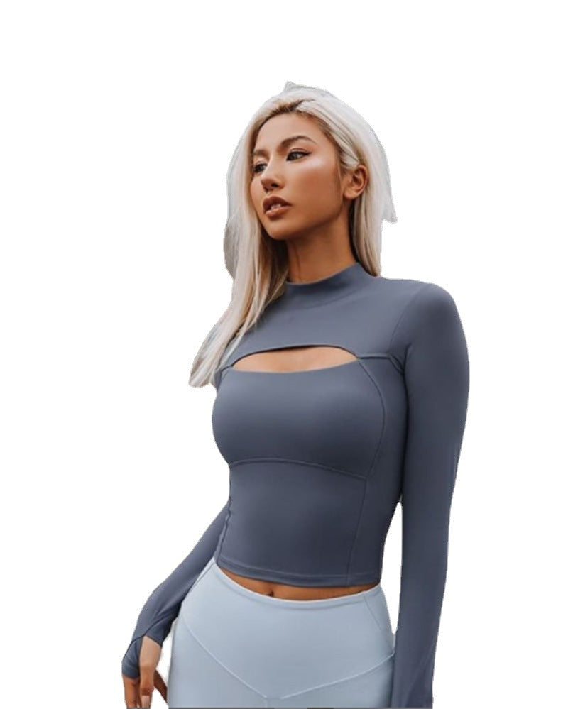 Damernas figurnära sporttop med hög krage och cut-out-detalj Mirla-Eva Jonsson