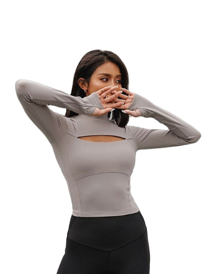 Damernas figurnära sporttop med hög krage och cut-out-detalj Mirla-Eva Jonsson
