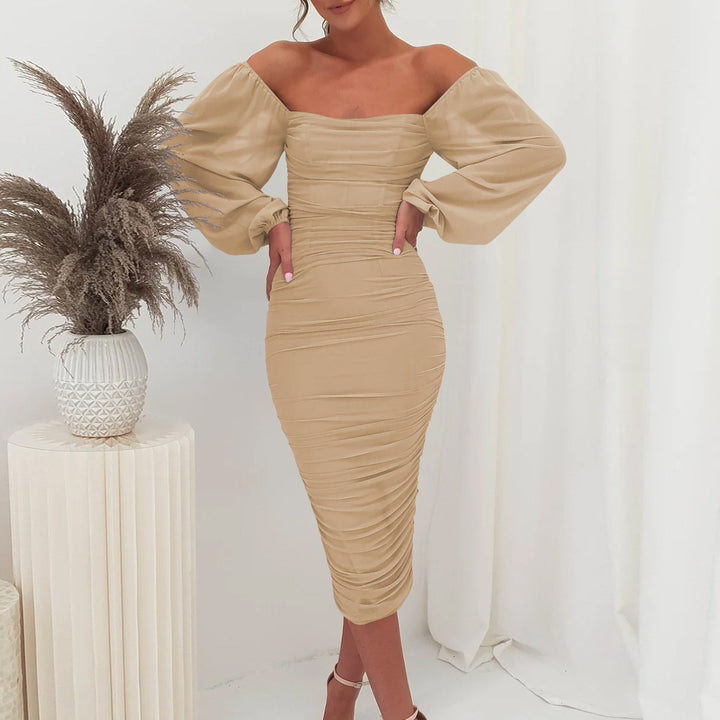 Damernas figuroptimerade klänning med puffärmar och rynkor Mirla-Eva Jonsson