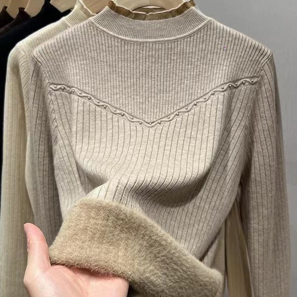 Damernas finstickad tröja med elegant ribbdesign och mjuk krage Mirla-Eva Jonsson