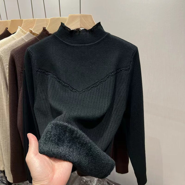 Damernas finstickad tröja med elegant ribbdesign och mjuk krage Mirla-Eva Jonsson