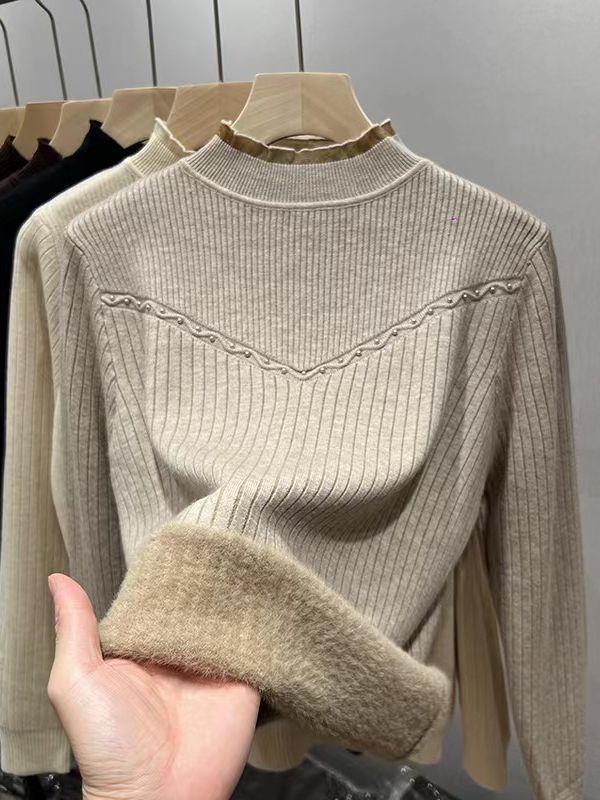 Damernas finstickad tröja med elegant ribbdesign och mjuk krage Mirla-Eva Jonsson