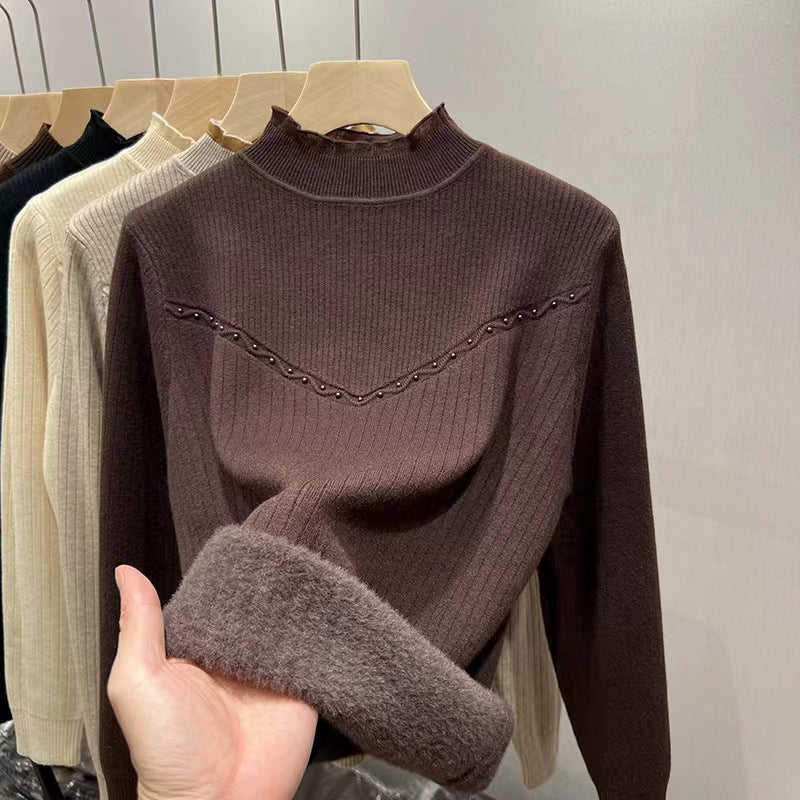 Damernas finstickad tröja med elegant ribbdesign och mjuk krage Mirla-Eva Jonsson