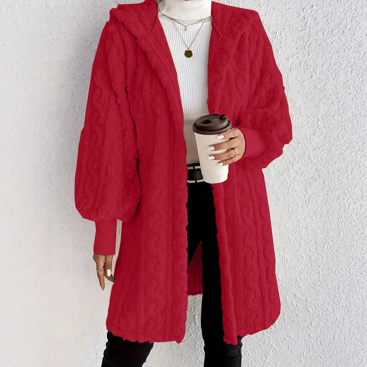 Damernas fleece-hoodie-jacka med voluminösa ärmar och praktisk huva Mirla-Eva Jonsson