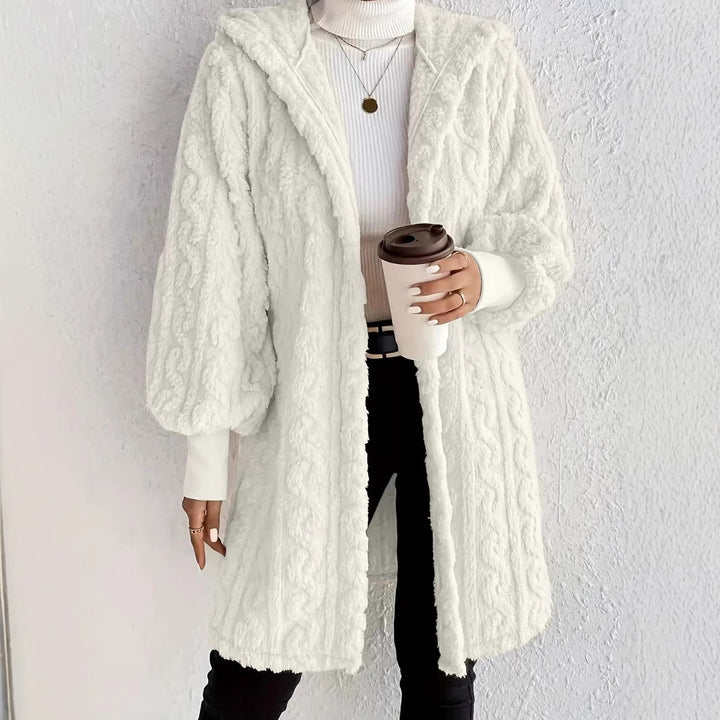 Damernas fleece-hoodie-jacka med voluminösa ärmar och praktisk huva Mirla-Eva Jonsson