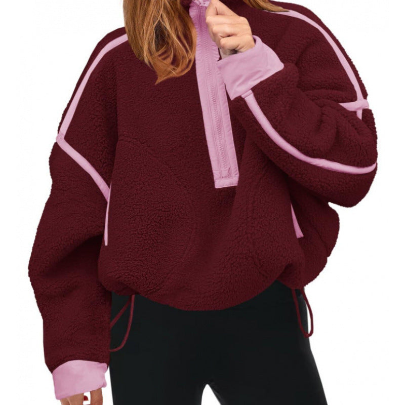 Damernas fleece-pullover med halv dragkedja och kontrasterande ärmar Mirla-Eva Jonsson