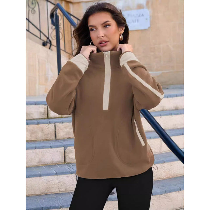 Damernas fleece-pullover med halv dragkedja och kontrasterande ärmar Mirla-Eva Jonsson
