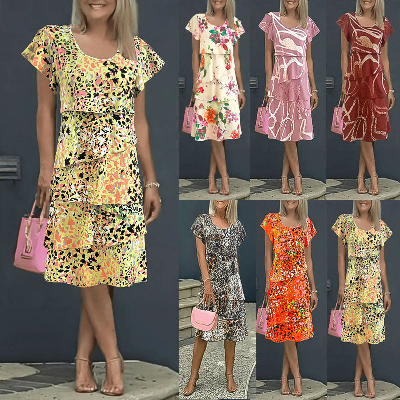 Damernas flödande omslagklänning med elegant lagerbyggande och unikt mönster Mirla-Eva Jonsson