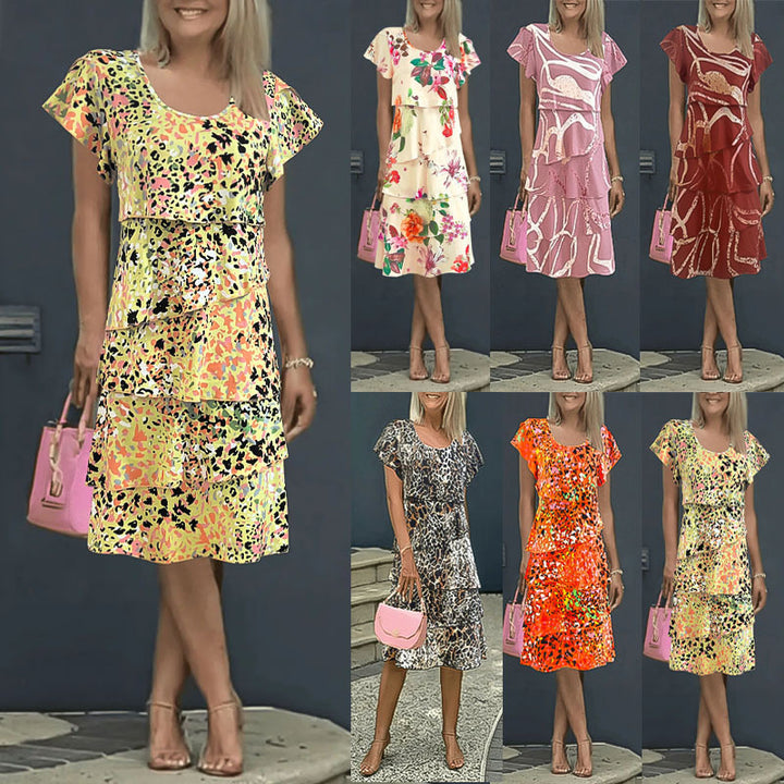 Damernas flödande omslagklänning med elegant lagerbyggande och unikt mönster Mirla-Eva Jonsson